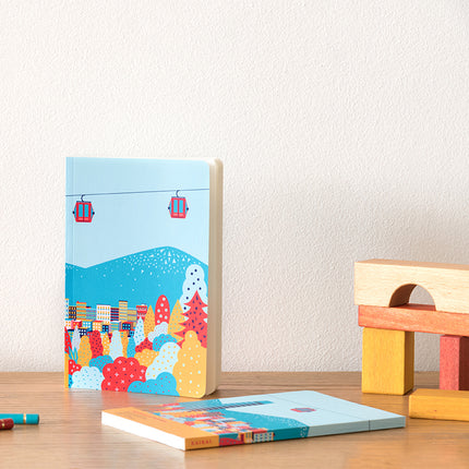libreta cuaderno croquis escritorio papelería paseos urbanos teleférico Santiago colores ciudad cordillera