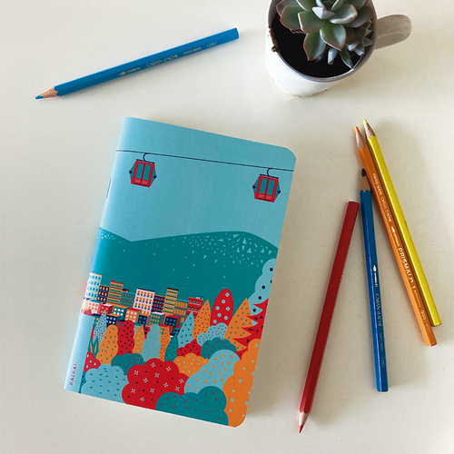 libreta cuaderno croquis escritorio papelería paseos urbanos teleférico Santiago colores ciudad cordillera